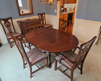 Mahogany table extra leaf, chairs and table pad $340.00