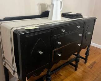 Buffet for storing the fine china & silver or just a sweet place to keep the napkins & linen