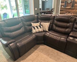 H80 - $1750 - Rooms To Go Sectional. Excellent Condition. Faux Leather. 3 Sections have electric recline. 
