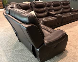 H80 - $1750 - Rooms To Go Sectional. Excellent Condition. Faux Leather. 3 Sections have electric recline. 