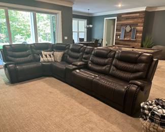 H80 - $1750 - Rooms To Go Sectional. Excellent Condition. Faux Leather. 3 Sections have electric recline. 