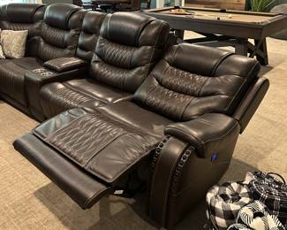 H80 - $1750 - Rooms To Go Sectional. Excellent Condition. Faux Leather. 3 Sections have electric recline. 