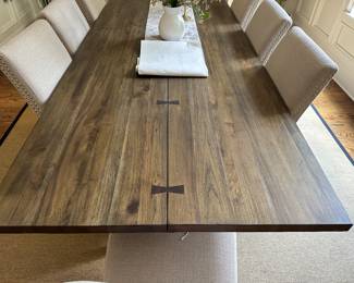 H6 - Table & Chairs Priced Individually. $850 - Maria Yee Dining Table measures 42" wide x 108" long x 30" tall. $450 - Set of 10 - "Handy Living" brand Dining Chairs. Measures 20" wide x 38" tall. 