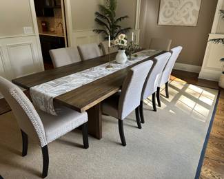 H6 - Table & Chairs Priced Individually. $850 - Maria Yee Dining Table measures 42" wide x 108" long x 30" tall. $450 - Set of 10 - "Handy Living" brand Dining Chairs. Measures 20" wide x 38" tall. 