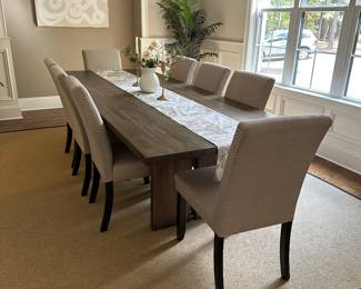 H6 - Table & Chairs Priced Individually. $850 - Maria Yee Dining Table measures 42" wide x 108" long x 30" tall. $450 - Set of 10 - "Handy Living" brand Dining Chairs. Measures 20" wide x 38" tall. 