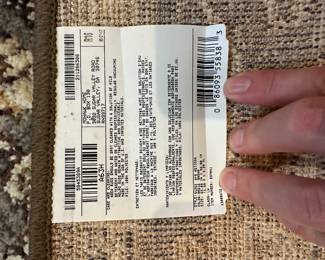 H10 - $75 - Mohawk Rug Measures 63" x 94". 