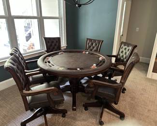 H89 - $250 - Poker Table with 6 chairs. Measures 53.5" round x 30.5" tall. 