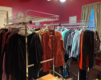 Lots of women’s clothes, purses, scarves, purses…