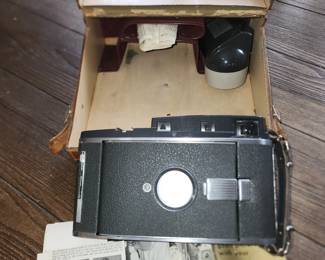 Polaroid land camera model 150 with the brochures, case and extra