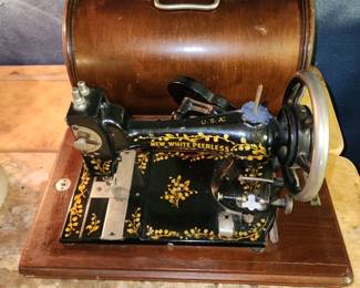 New White Peerless sewing machine with cover