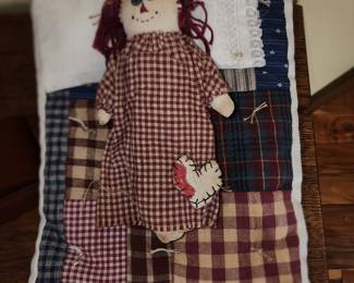 Doll bed with small doll, cute