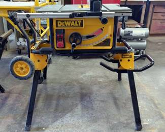 Dewalt 10" Table Saw, Model DWE7491, With Dewalt Table Stand, Model DWE74911, Powers On
