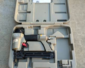 Porter Cable Pneumatic 1/4" Crown Stapler, Model NS150 A, In Hard Sided Carry Case, And Grip Rite Plastic Cap Stapler, Model GRC58A, In Hard Sided Carry Case
