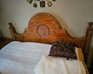 Solid wood bedroom suite. It is a full but the headboard is adjustable to where you can make it a queen bed.