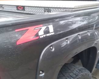 2010 LTZ Silverado Z71 Rocky Ridge package, V8. 6.2 liter. K1500. brand new engine, new tires, Major speed alignment & tire shocks done. Dark grey. black leather interior. 166600 miles approx. Z71 package has Heavy duty rear axel, premium stereo system, 6"lift, towing package, moon roof, sliding back window, real full size spare tire. Tool box. Silent bids only. Come inspect the vehicle during the estate sale. Bids closes Monday Noon. 