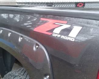 2010 LTZ Silverado Z71 Rocky Ridge package, V8. 6.2 liter. K1500. brand new engine, new tires, Major speed alignment & tire shocks done. Dark grey. black leather interior. 166600 miles approx. Z71 package has Heavy duty rear axel, premium stereo system, 6"lift, towing package, moon roof, sliding back window, real full size spare tire. Tool box. Silent bids only. Come inspect the vehicle during the estate sale. Bids closes Monday Noon. 