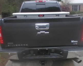 2010 LTZ Silverado Z71 Rocky Ridge package, V8. 6.2 liter. K1500. brand new engine, new tires, Major speed alignment & tire shocks done. Dark grey. black leather interior. 166600 miles approx. Z71 package has Heavy duty rear axel, premium stereo system, 6"lift, towing package, moon roof, sliding back window, real full size spare tire. Tool box. Silent bids only. Come inspect the vehicle during the estate sale. Bids closes Monday Noon. 