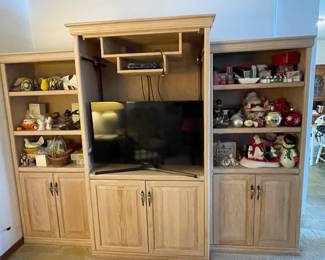 $450 for all 3 if wood or Center $150 - Sides $175 each                                                                                                  
Wood Entertainment center with shelves (3 pieces)
 doors are off center piece but could be put back on
 Center 40x24x77 $150, side shelves 30x18x72
