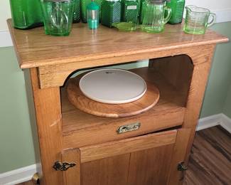 Reproduction Polar Ice cabinet (on casters). Vintage green glass canisters and such