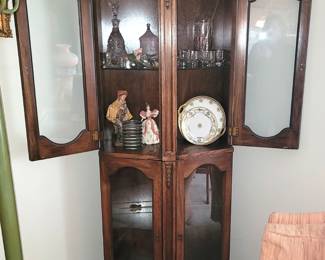 Corner curio cabinet.