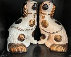 Pair of large Straffordshire copper luster Spaniels.