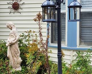 Heavy but beautiful bird bath and attached statue