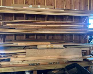 Large collection of new and remnant wood pieces;  white Oak, Teak, Mahogany, Ash, Custom trim boards, and a piece of bowling alley lane!