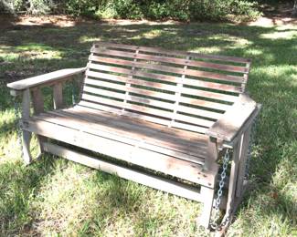 1950s  glider. In great usable condition , always  just rubbed with Thompson water seal so the beauty of the wood come through