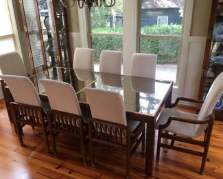 Henredon table with 2 leaves & 10 professionally upholstered chairs purchased in the 1970’s  this is in pristine condition