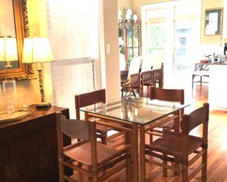 Seventies original glass top. Leather back and seat, notice the buckle side strap. This set was purchased new from Neiman Marcus in Atlanta and has been used for dining and  game table.