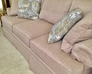 Designer fabric used on the sleeper sofa. Never used. Photo doesn’t do justice as my camera made this appear pink and it is not it is a beautiful beige color