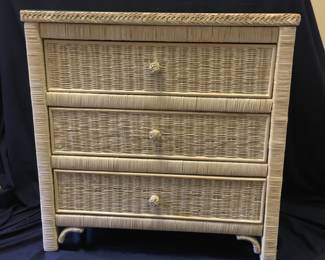 3 Drawer wicker chest has nice glass top.30.5 x 18.25x 39.