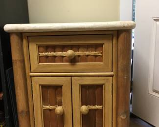 Genuine bamboo night stand with composite top.