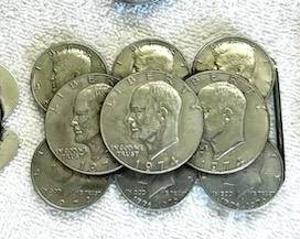 Money clips and Eisenhower dollars belts buckle
