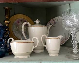Tea service, brass candlesticks, and more