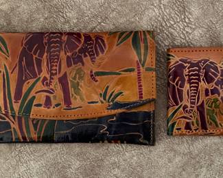 Leather wallets with elephant motifs