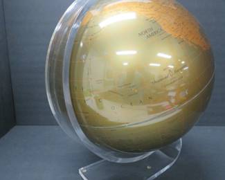 Vintage globe with lucite stand