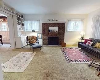LIVING ROOM WITH RUGS