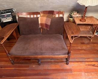 COUCH WITH WOOD ARMS THAT OPEN TO TRAYS