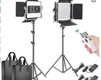 Neewer LED Light Kit with remotes, stands, power cables, and cases. Has the ability to add battery packs.  Very little usage.