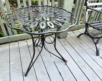 Outdoor Black Metal Bistro Table with Floral Design
