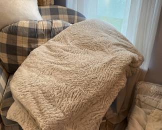 Assortment of Throw Blankets and Throw Pillows