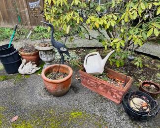 Assortment of Outdoor Decor and Planters