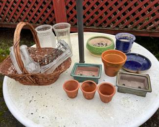 Assortment of Outdoor Decor and Planters