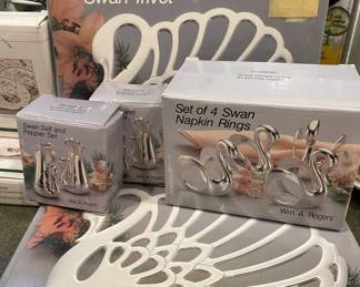 Set of 4 Wm. A. Rogers Swan Napkin Rings, 2 WM. A. Rogers Swan Trivets, 2 Boxed WM. A. Rogers Swan Salt and Pepper Shakers