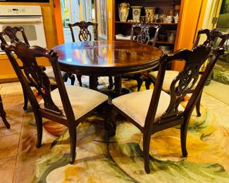 $495
Universal Furniture NC Round table 54Dx30H with Chippendale style 2 arms + 4 chairs