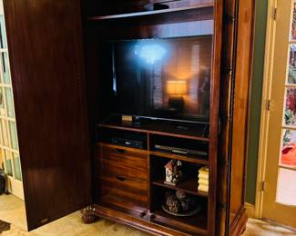 $495
TV armoire fits a 50""TV - 54x26x84" Bahama style bamboo