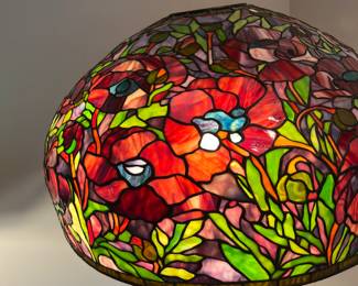 Red floral shade on floor lamp