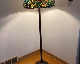 Floor lamp with large turquoise tone shade