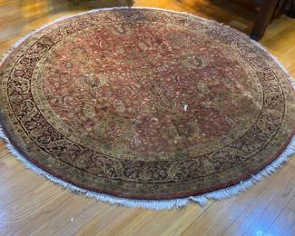 Hand Knotted circular carpet brown tones